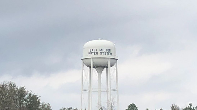 A water tower labeled East Milton Water System
